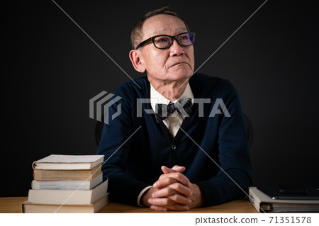 Senior man with bow tie worries Senior man with bow tie worries 71351578
