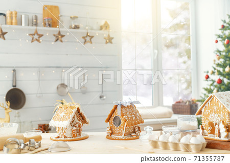 Christmas gingerbread houses on the table 71355787