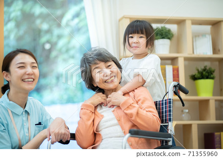 Grandma playing with grandchildren Elderly housing with care 71355960