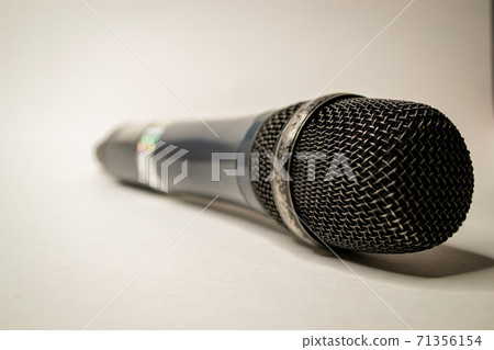 Wireless microphone isolated on white background Wireless microphone isolated on white background 71356154
