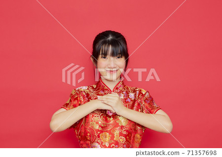 Asian woman wear Chinese dress with action 71357698