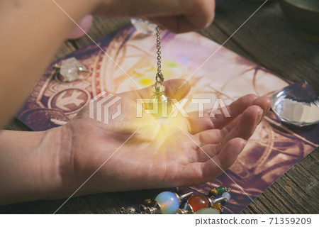 Palm reading with pendulum 71359209