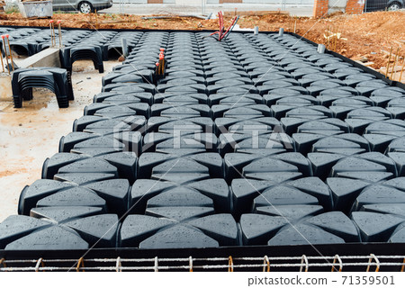 Detail of reinforced concrete screed with no-recoverable plastic formworks under construction Detail of reinforced concrete screed with no-recoverable plastic formworks under construction 71359501