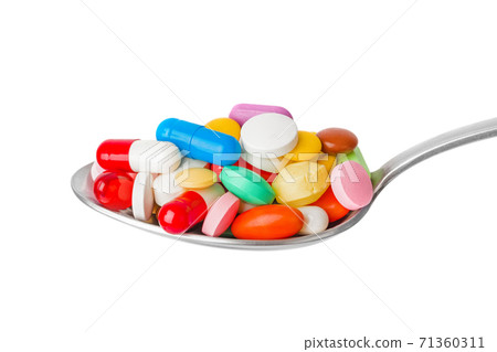 Spoon with pills 71360311