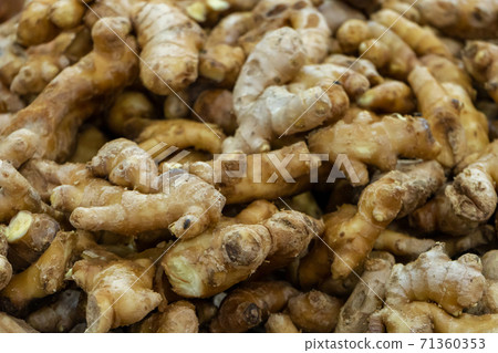 Ginger root counter at grocery store close up Ginger root counter at grocery store close up 71360353