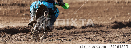 Racer child on motorcycle participates in motocross race, active extreme sport 71361855