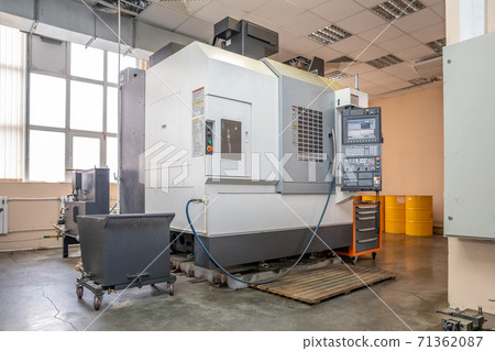 a number of CNC machines in the production room. Interior of industrial premises 71362087