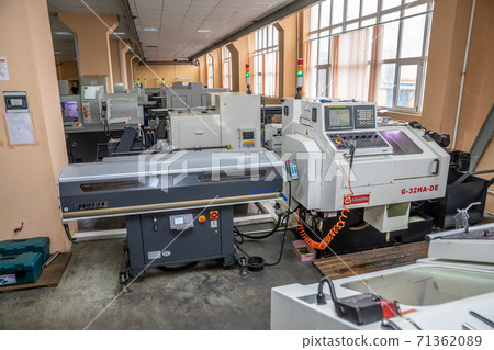 a number of CNC machines in the production room. Interior of industrial premises 71362089