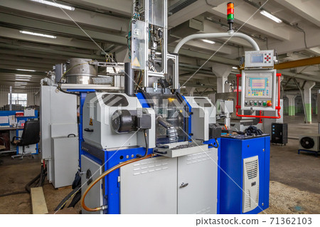 a number of CNC machines in the production room. Interior of industrial premises 71362103