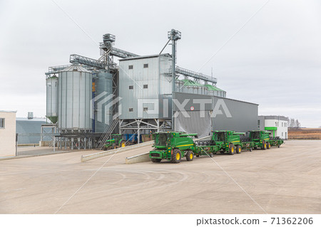 modern agricultural enterprise appearance. Industrial buildings made of galvanized metal, cloudy day 71362206