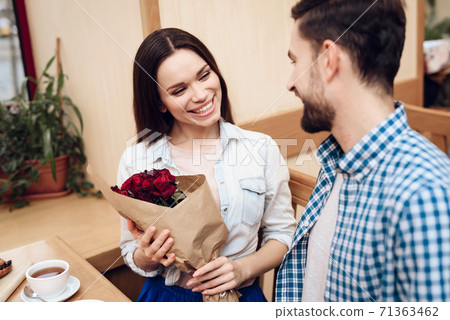 Happy Young Couple Have Date in Modern Cafeteria. Happy Young Couple Have Date in Modern Cafeteria. 71363462