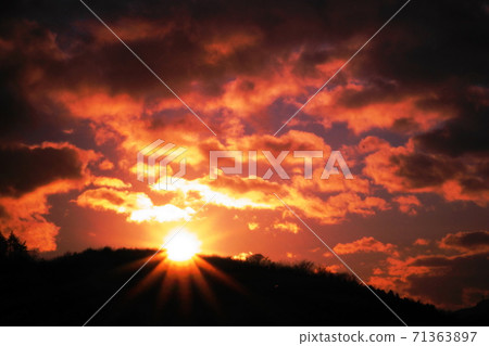 Sunrise from the mountain, shining in the clouds Sunrise from the mountain, shining in the clouds 71363897