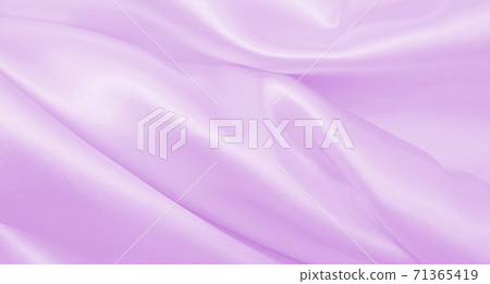 Smooth elegant lilac silk or satin texture as wedding background. Luxurious valentine day background design Smooth elegant lilac silk or satin texture as wedding background. Luxurious valentine day background design 71365419