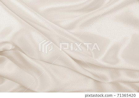 Smooth elegant golden silk or satin luxury cloth texture as wedding background. Luxurious background design. In Sepia toned. Retro style Smooth elegant golden silk or satin luxury cloth texture as wedding background. Luxurious background design. In Sepia toned. Retro style 71365420