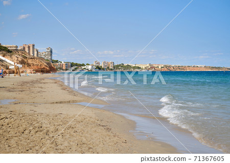 Mil Palmeras sandy empty beach. Spain 71367605