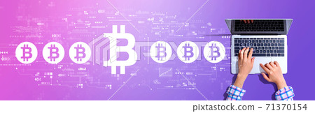 Bitcoin theme with woman using a laptop Bitcoin theme with woman using a laptop 71370154