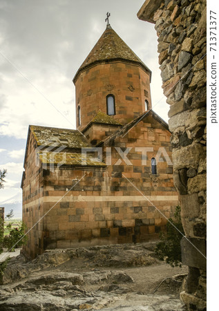 View of the back of the medieval Church of the Holy Virgin, built on basalt boulders 71371377