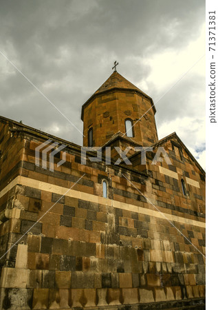 Khor Virap fortress overlooking the back corner of the medieval Church of the Holy virgin, overlooking a ribbed drum with an umbrella dome Khor Virap fortress overlooking the back corner of the medieval Church of the Holy virgin, overlooking a ribbed drum with an umbrella dome 71371381