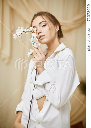young sensual woman in studio interior young sensual woman in studio interior 71372029