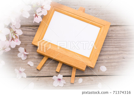 Photo frame and cherry blossoms oval blur 71374316