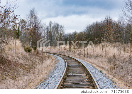 Single railway line at autumn day time. 71375688