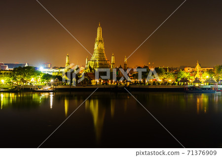 Wat Arun with Chao Phraya river at night in Bangkok, Thailand Wat Arun with Chao Phraya river at night in Bangkok, Thailand 71376909
