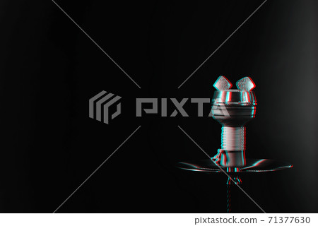 charcoals in a hookah bowl on a dark background 71377630