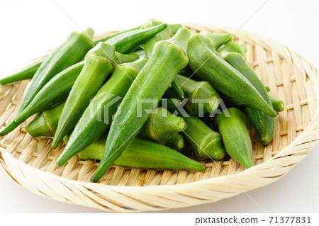 Okra in a bamboo basket 71377831