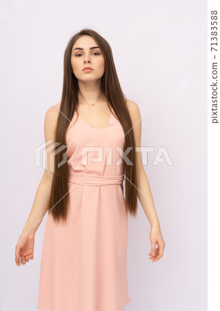 Young woman with long hair. Brunette 71383588