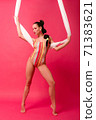 Full height body size view portrait slim busty body sexy seductive sensual woman gymnast in retro swim suit stand on toes artistic pose with hands hold air silk isolated over pink background 71383621