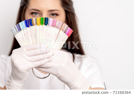 Manicure master with nail sample palette Manicure master with nail sample palette 71388364