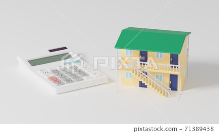 Toy apartment and calculator placed on a flat surface Toy apartment and calculator placed on a flat surface 71389438