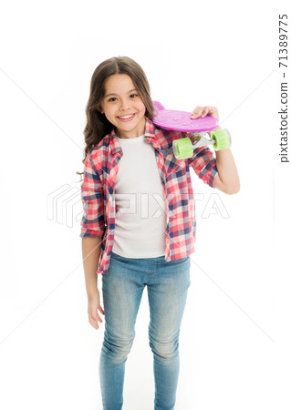 Little child smile with penny board isolated on white. Happy skater girl.  71389775