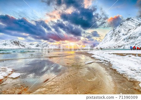 Fabulous winter scenery with Haukland beach during sunset and snowy  mountain peaks near Leknes. 71390309