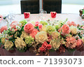 Wedding main table flowers 71393073