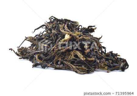 Dry Leaves of Green Tea Isolated on White Background Dry Leaves of Green Tea Isolated on White Background 71395964