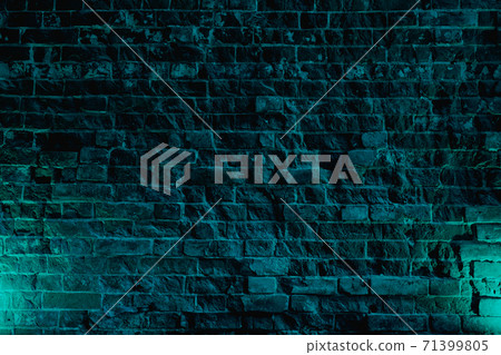 Solid brick wall with rough old masonry. Dark abstract background for the design.  71399805