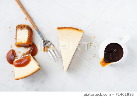 Cheesecake with caramel sauce top view Cheesecake with caramel sauce top view 71401956