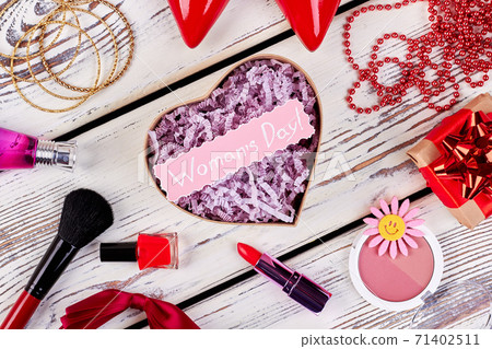 Box with card and cosmetics. Box with card and cosmetics. 71402511