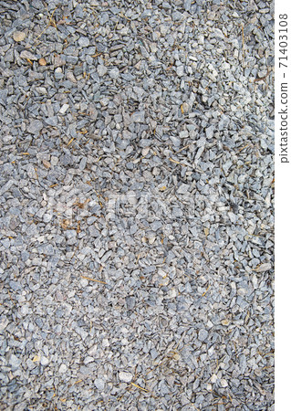 Crushed stone background, gray stone texture. Crushed stone background, gray stone texture. 71403108
