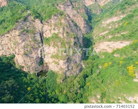 Natural waterfall in the mountain Natural waterfall in the mountain 71403152