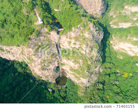Natural waterfall in the mountain Natural waterfall in the mountain 71403155