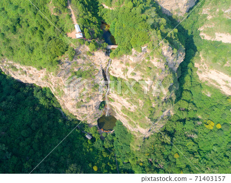 Natural waterfall in the mountain Natural waterfall in the mountain 71403157