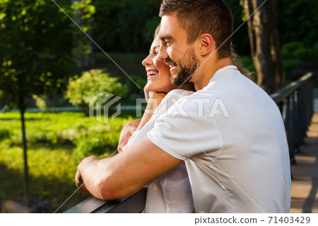Lovers man and woman. Honeymoon trip. 71403429