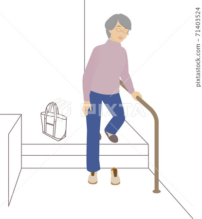 A woman holding on to a railing at the front door and wearing shoes 71403524