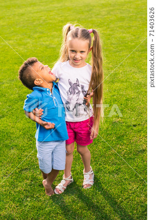 Two cute children. Two cute children. 71403626