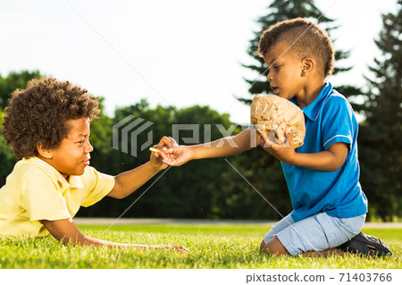 Guys have a lunch. 71403766