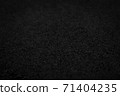 Abstract black background with sandpaper texture 71404235