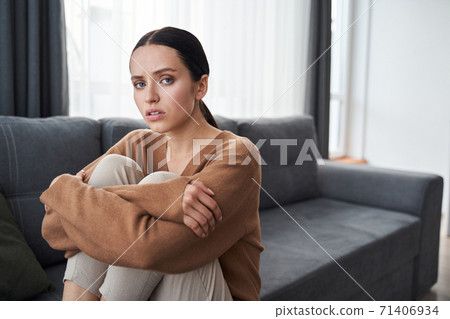 Woman thinking about her problems Woman thinking about her problems 71406934