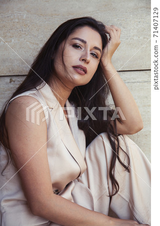 young pretty brunette woman in fashion suit at business building posing cheerful, lifestyle people concept young pretty brunette woman in fashion suit at business building posing cheerful, lifestyle people concept 71407129